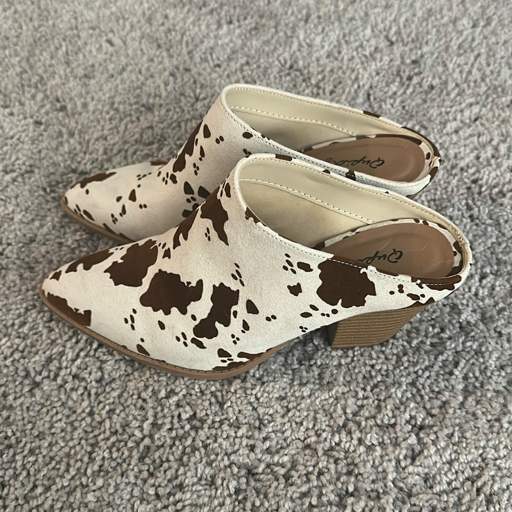 Cow print mule block heels (slip-on). Worn briefly bought from a boutique.